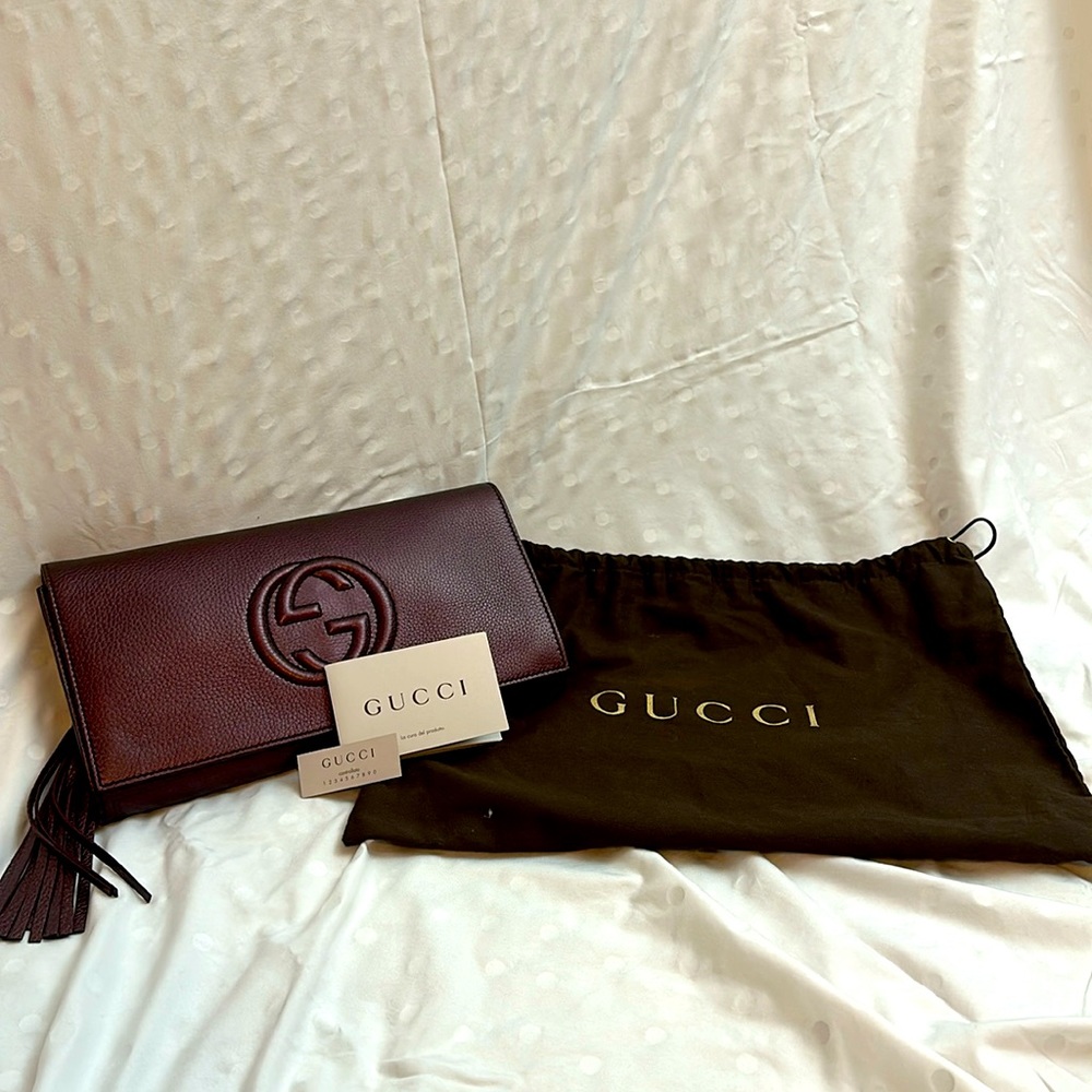 Gucci clutch metallic burgundy color. Brand new